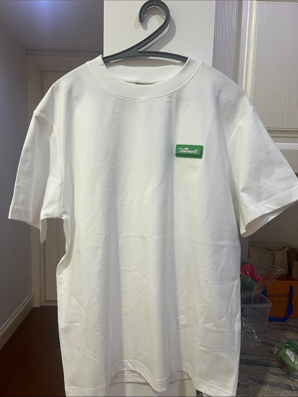 White unisex Crew Neck T-Shirt with Green Chest Patch Brand new